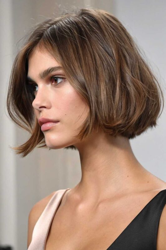 A woman with an Italian bob hairstyle.
