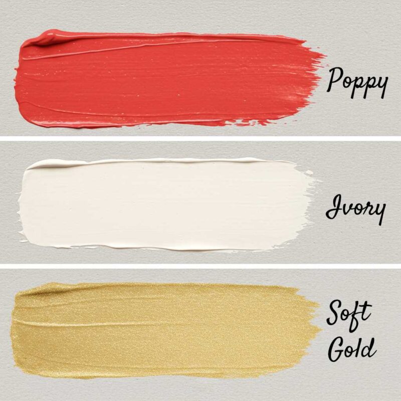 Wedding color palette featuring three elegantly painted color stripes—Poppy, Ivory, and Soft Gold.